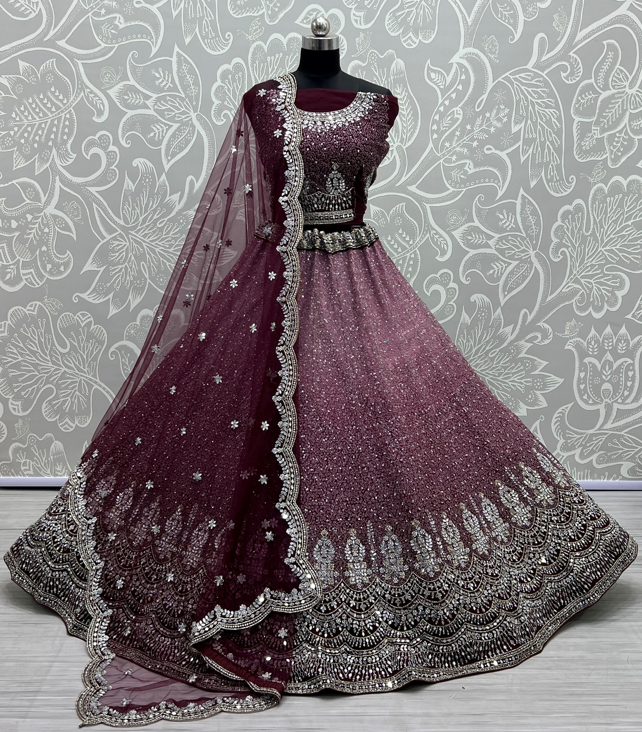 Bollywood Design Of Net Bridal Lehenga Choli In Purple